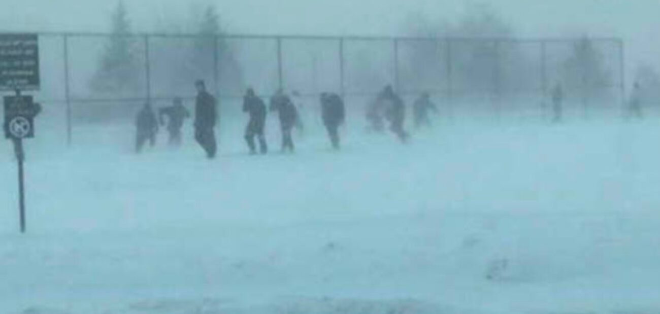 The Northern Michigan University Olympic Training Site team running sprints through a blizzard near Lake Superior in Marquette, Michigan