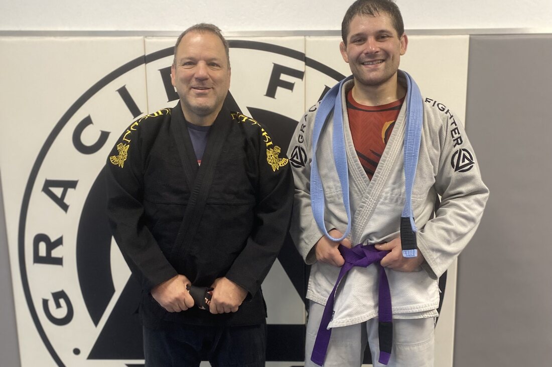 Orry Elor in his gi with his new Jiu Jitsu purple belt at Graciefighter, Pleasant Hill